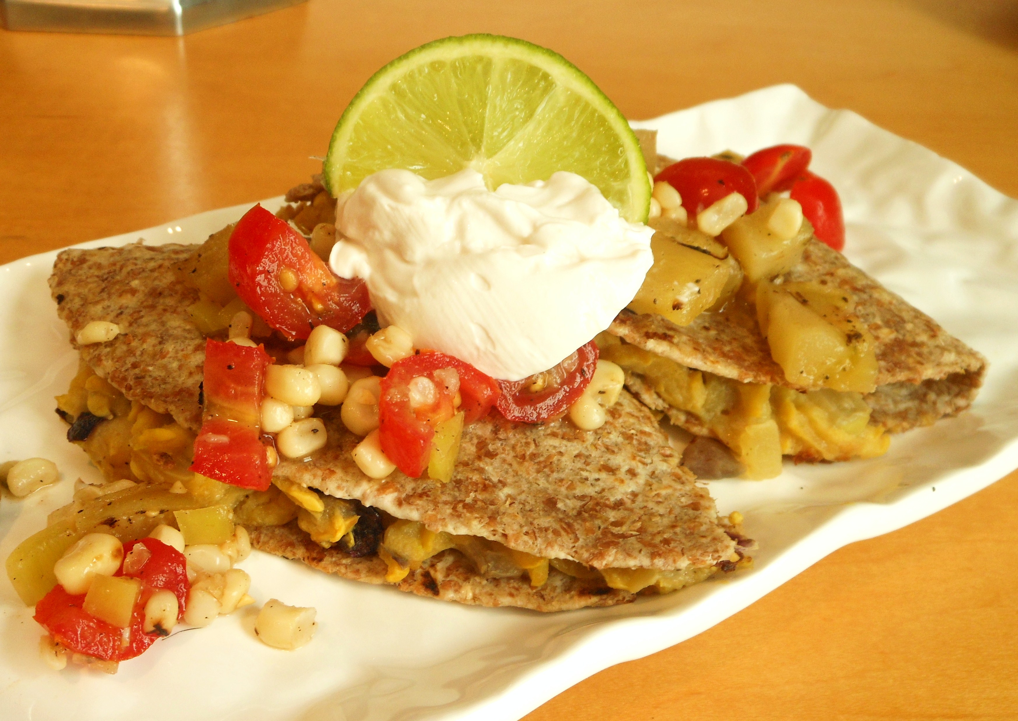 Vegan Cheesy Yellow Squash Quesadillas Topped With Grilled Green Tomato And Charred Corn Salsa Vegan Recipes For Vegans And Vegetarians The Blooming Platter In Virginia Beach Va