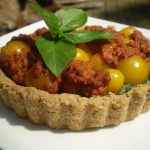 Vegan Golden Grape Tomato Tart with Spinach Pesto and Spicy Romesco Sauce