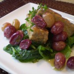 Vegan Grilled Tempeh Over Sauteed Baby Spinach with White Wine Pan Sauce and Roasted Thyme-Scented Grapes