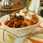 Vegan Lentils with Soy Chorizo, Orange Tomato, Caramelized Onion, and Kale